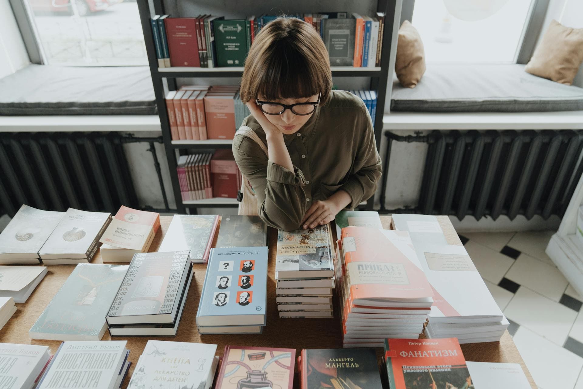 Image of a girl reading books
